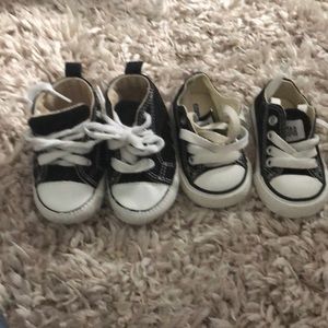 2 pair of converse shoes